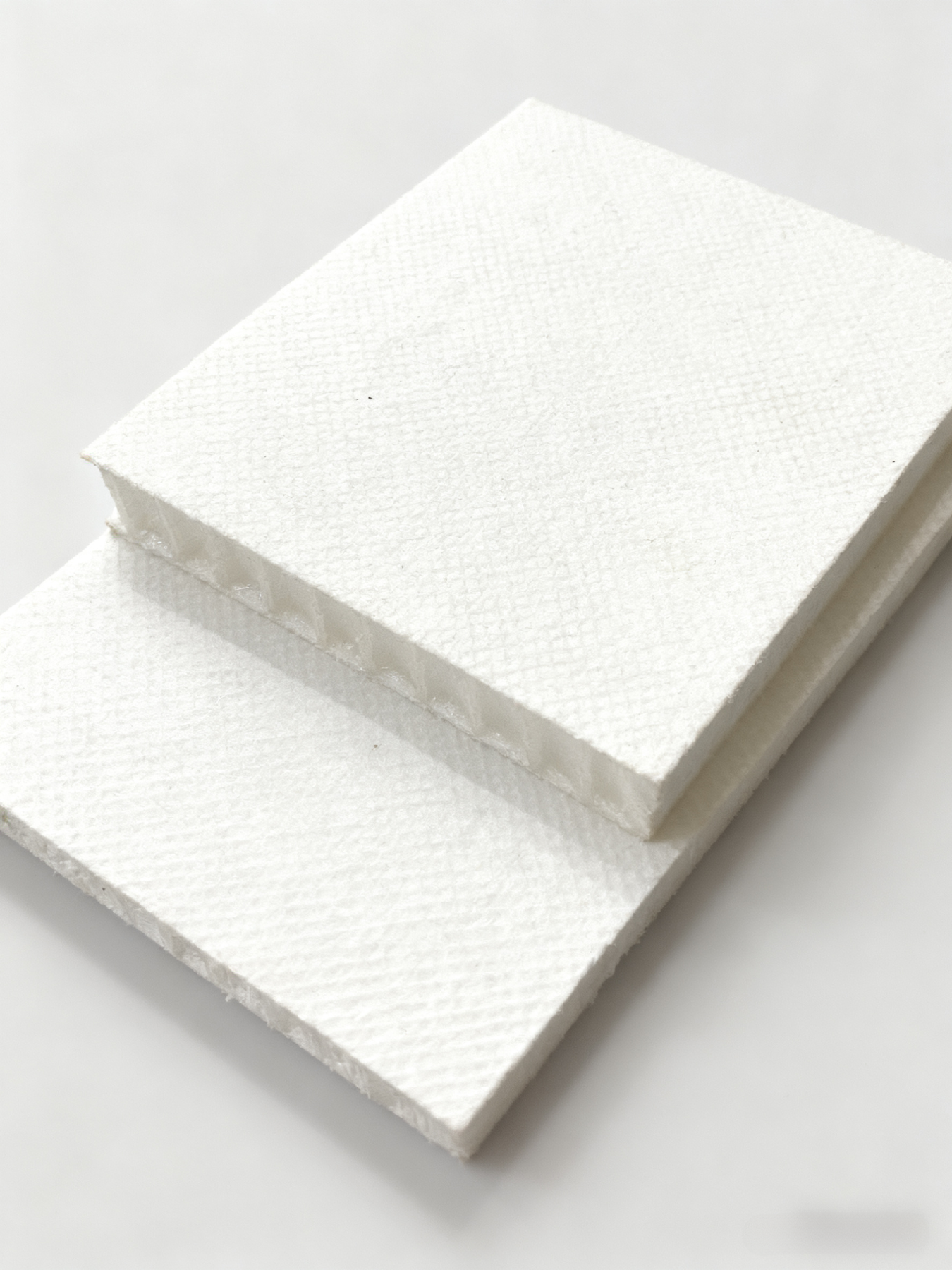 Thermoplastic honeycomb with non-woven