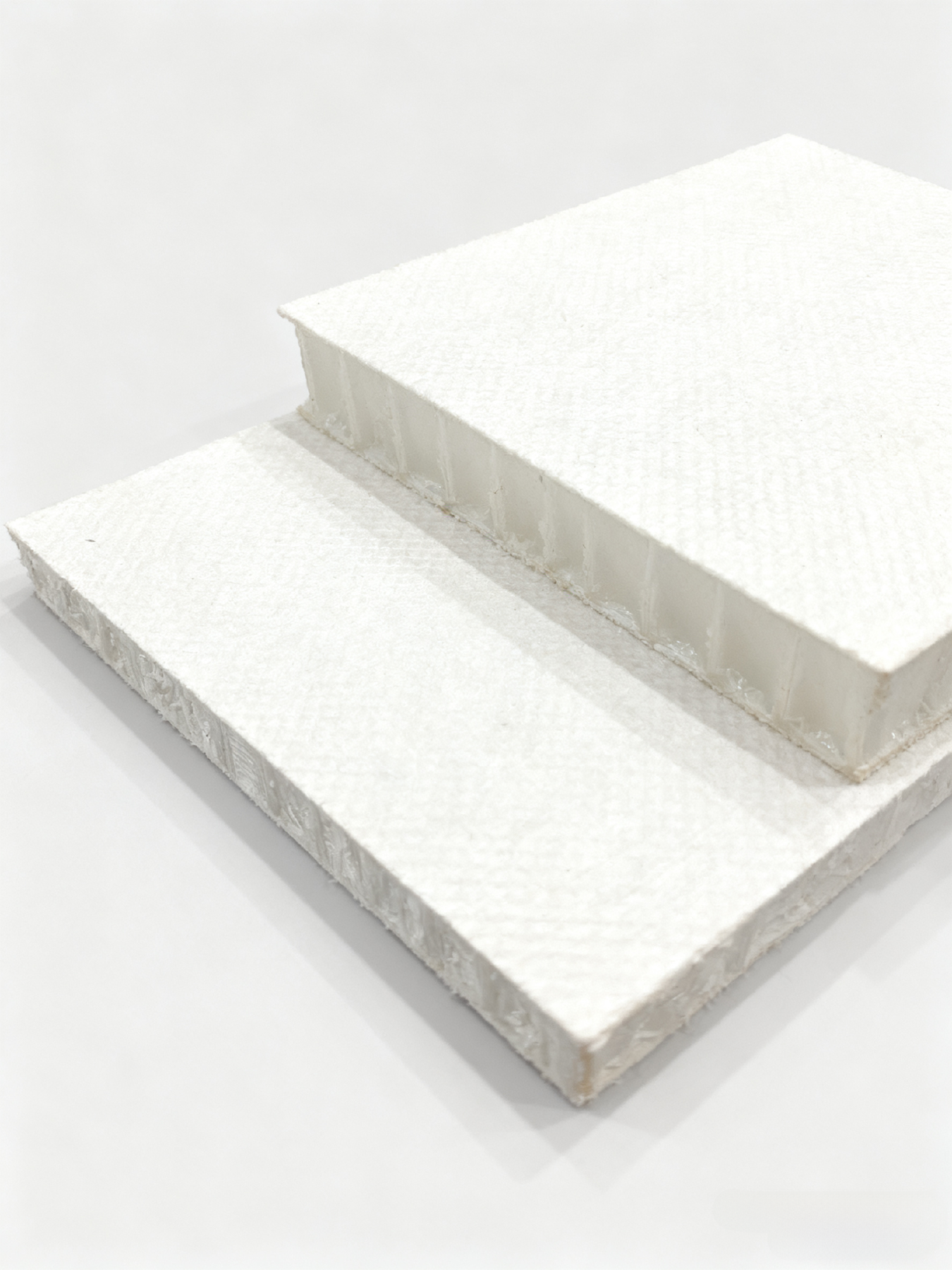 Thermoplastic honeycomb with non-woven